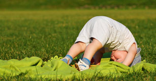 Child doing a somersault
